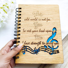 Load image into Gallery viewer, Laser cut and engraved wooden diary with musical quote and design