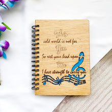 Load image into Gallery viewer, Laser cut and engraved wooden diary with musical quote and design