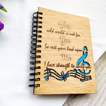 Load image into Gallery viewer, Laser cut and engraved wooden diary with musical quote and design
