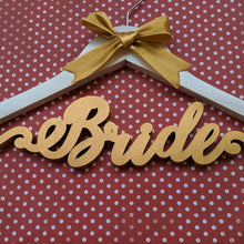 Load image into Gallery viewer, Personalized and customized hanger for wedding photoshoot with outfits for bride and groom | One hanger with single line text