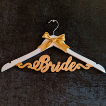 Load image into Gallery viewer, Personalized and customized hanger for wedding photoshoot with outfits for bride and groom | One hanger with single line text