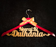 Load image into Gallery viewer, Personalized and customized hanger for wedding photoshoot with outfits for bride and groom | One hanger with double line text