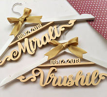 Load image into Gallery viewer, Personalized and customized hanger for wedding photoshoot with outfits for couple